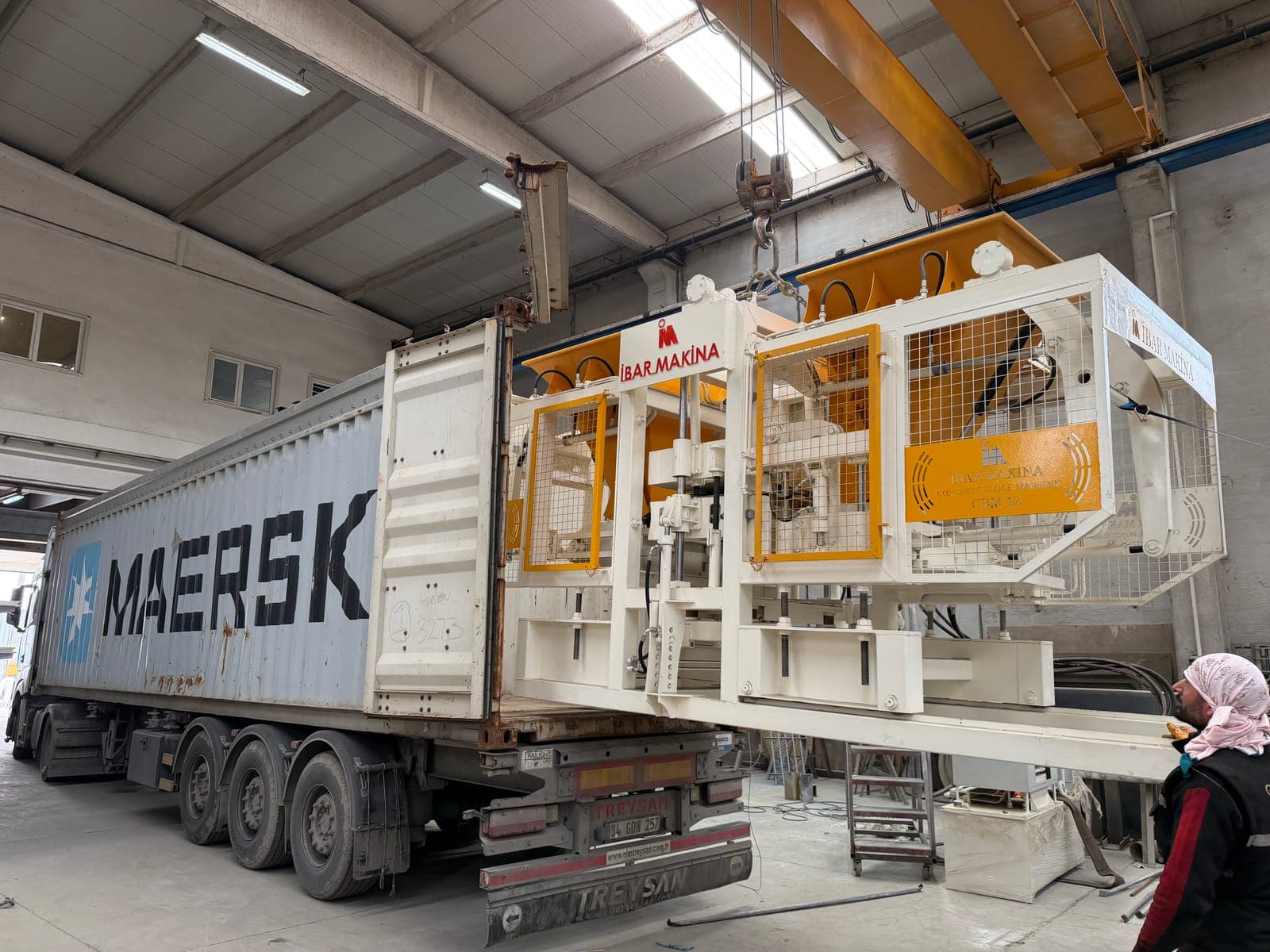 CBM 12 concrete block machine being loaded into a container for Sierra Leone
