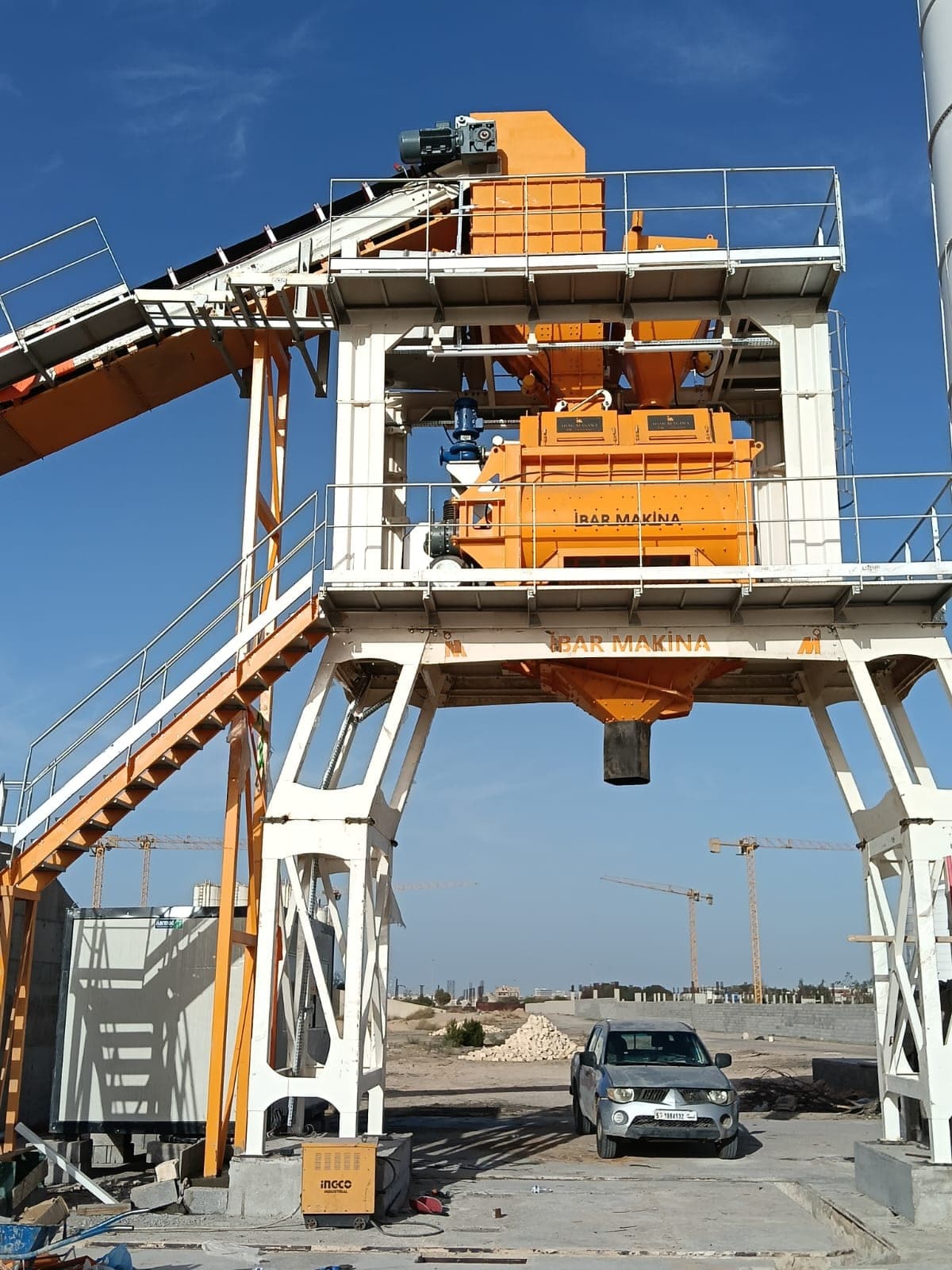 Twin-shaft mixer on the steel tower of the PROMIX 135 concrete batching plant in Misrata, Libya