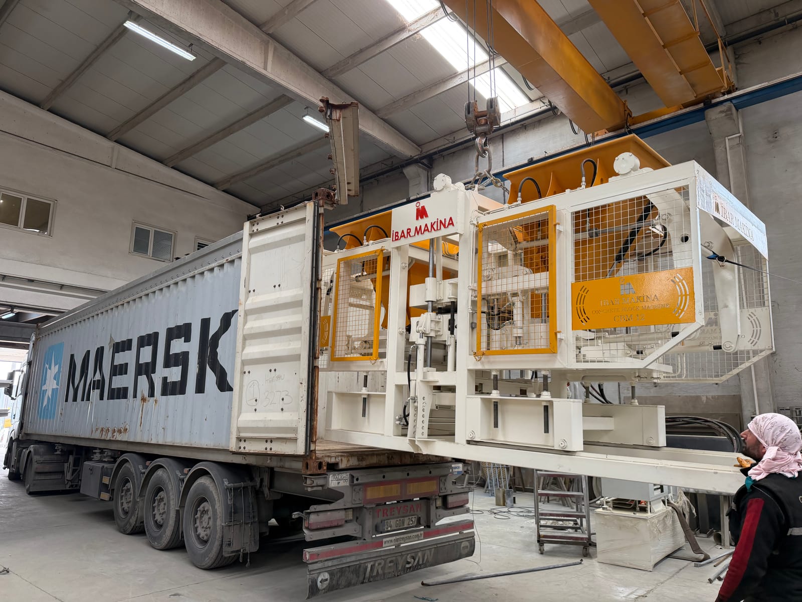 CBM 12 block making machine being loaded into a container for Sierra Leone