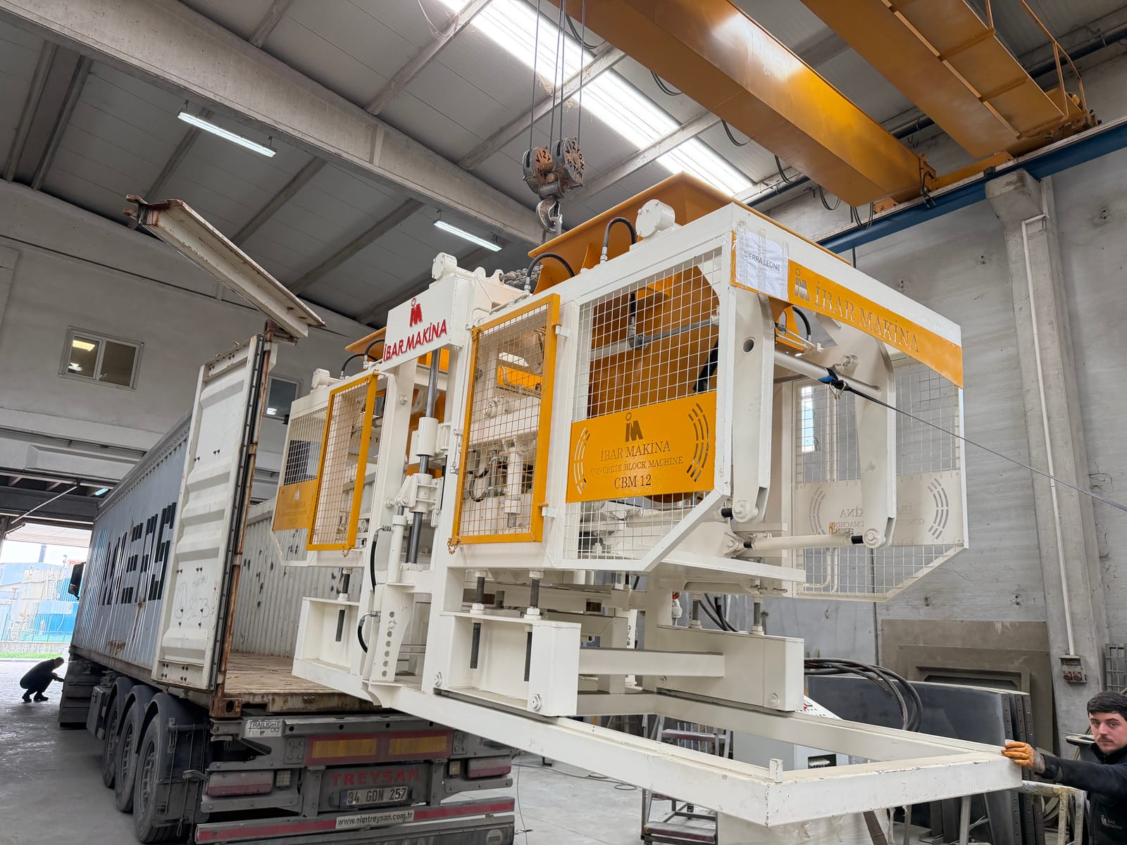İBAR MAKİNA CBM 12 block making machine with a Sierra Leone shipping label
