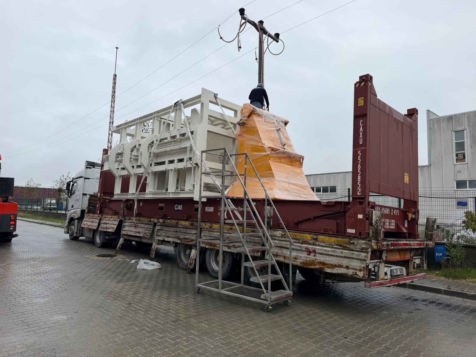 CPM 1400 PRO automatic concrete pipe machine strapped on a 40 ft flat-rack container for shipment to Costa Rica
